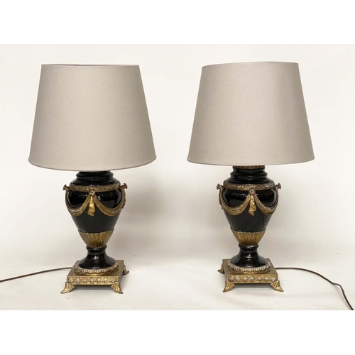 155 - TABLE LAMPS, a pair, black ceramic and gilt metal mounted of vase form with shades, 75cm H. (2)