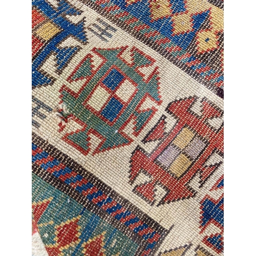 120 - ANTIQUE CAUCASIAN KAZAK RUNNER, 290cm x 132cm.