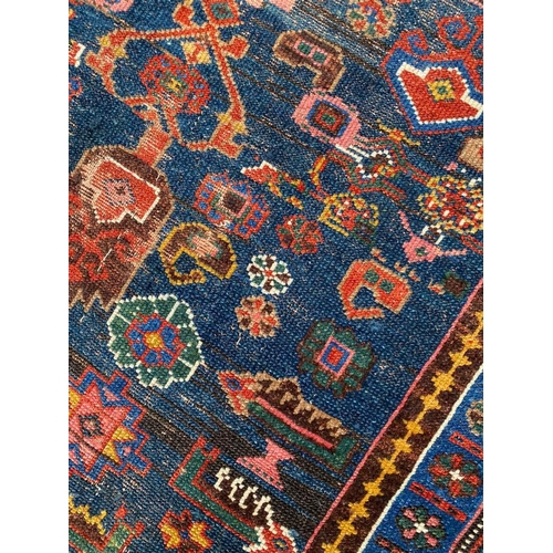 125 - ANTIQUE KURDISH RUNNER, 230cm x 135cm.