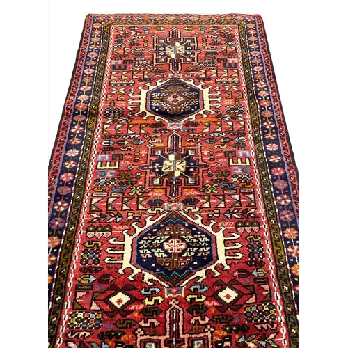 128 - PERSIAN HERIZ LONG RUNNER, 402cm x 82cm.