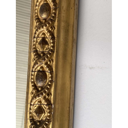 138 - TRIPLE PLATE OVERMANTEL, Victorian giltwood and gesso with ribbon crest, rosette swag above arched t... 