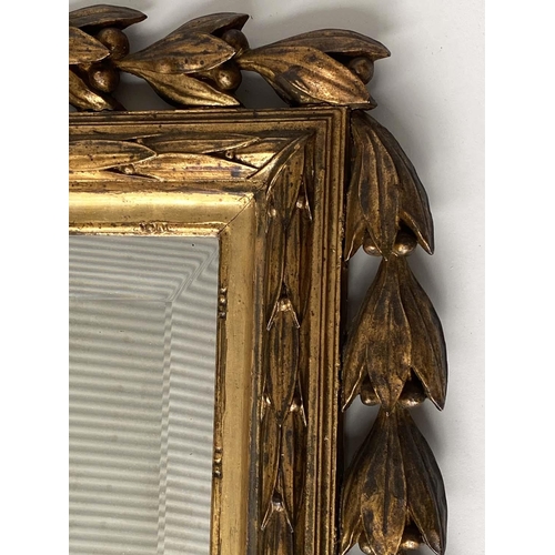 168 - WALL MIRROR, French 19th century Louis XVI style carved giltwood with urn crest, bell husk swags and... 