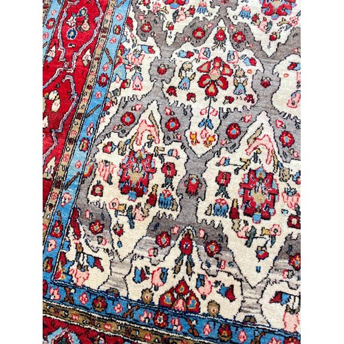 114 - ANTIQUE PERSIAN QUM CARPET, 325cm x 220cm.