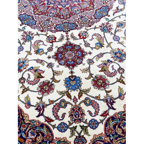 117 - FINE SIGNED HEREKE CARPET, 270cm x 210cm.