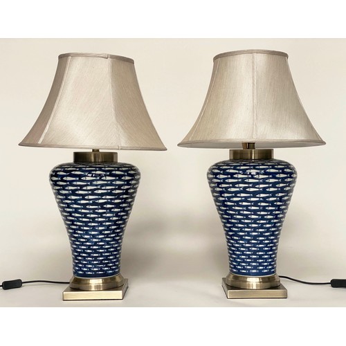 142 - TABLE LAMPS, a pair, ceramic blue and white myriad fish pattern of tapering form with shades, 75cm. ... 