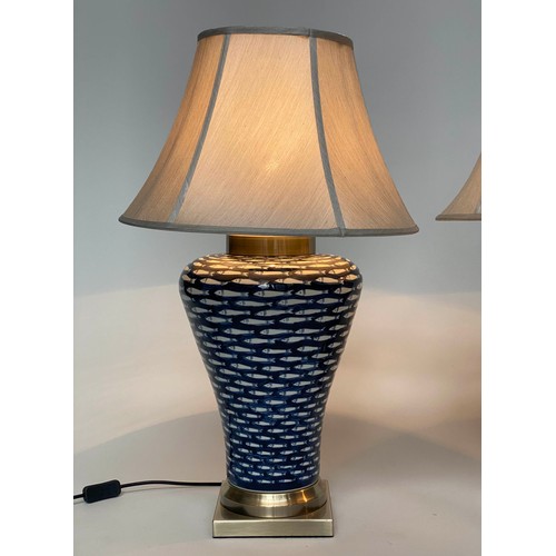 142 - TABLE LAMPS, a pair, ceramic blue and white myriad fish pattern of tapering form with shades, 75cm. ... 