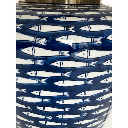 142 - TABLE LAMPS, a pair, ceramic blue and white myriad fish pattern of tapering form with shades, 75cm. ... 