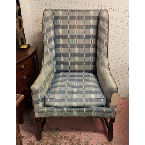 156 - OS DE MOUTON WING ARMCHAIR, late 19th century French oak with ikat upholstery, 115cm H x 72m.