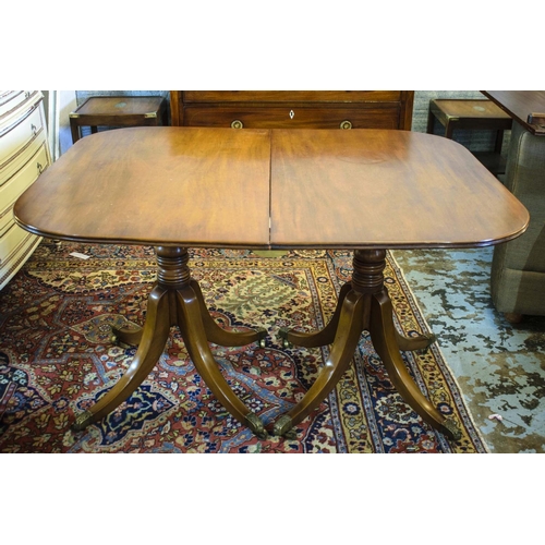 158 - TWIN PEDESTAL DINING TABLE, Georgian mahogany with two extra leaves, brass clips and castors, 72cm H... 