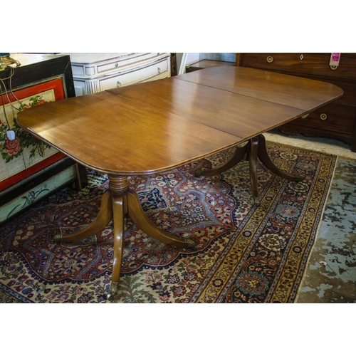 158 - TWIN PEDESTAL DINING TABLE, Georgian mahogany with two extra leaves, brass clips and castors, 72cm H... 