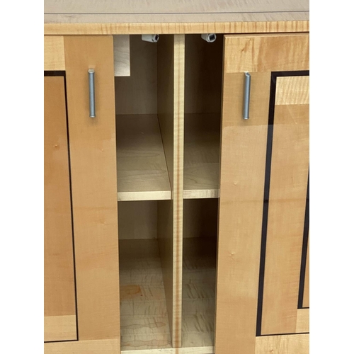 287 - SIDEBOARD, Art Deco style satinwood, with two geometric incised panelled doors.