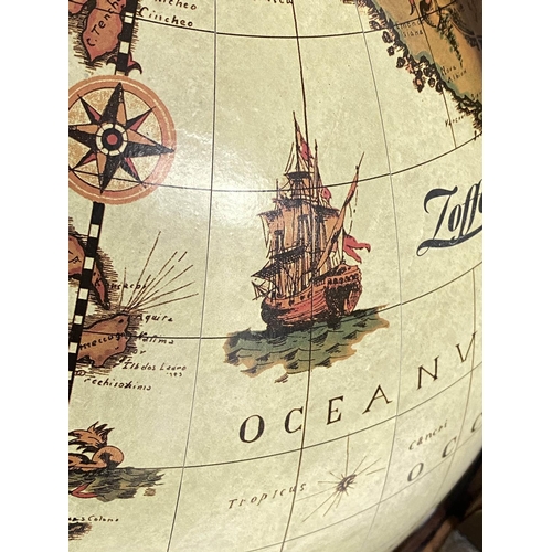 293 - GLOBE COCKTAIL CABINET, 90cm H, in the form of an antique terrestrial globe, on stand, with rising l... 