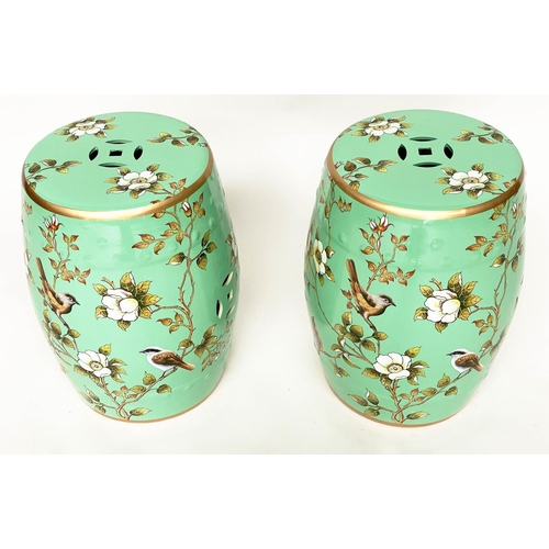 295 - CHINESE STOOLS, 45cm H, a pair, ceramic pierced barrel form, with gilt bird and flower decoration. (... 