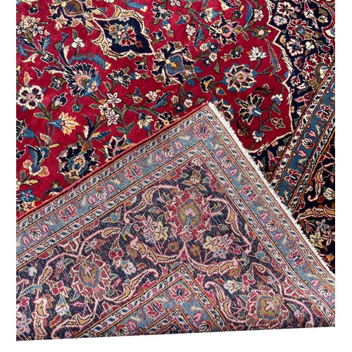 89 - FINE PERSIAN SIGNED KASHAN CARPET, 338cm x 218cm.