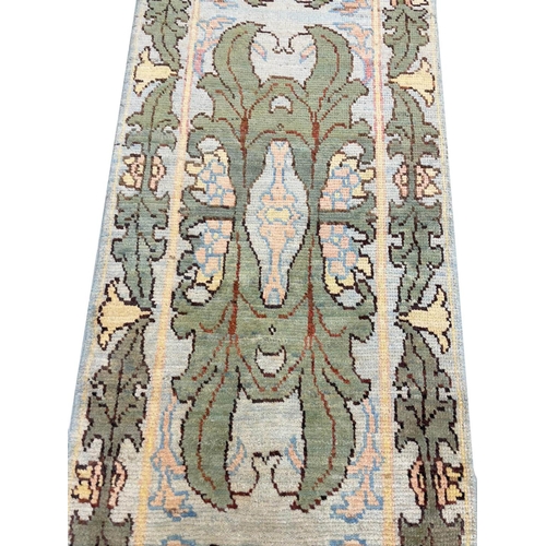 95 - ARTS AND CRAFTS DESIGN RUNNER, 398cm x 89cm, C.F.A Voysey inspired.