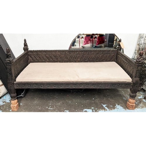 176 - NEPALESE DAYBED, 195cm W, carved wood with later alcantara seat cushion.