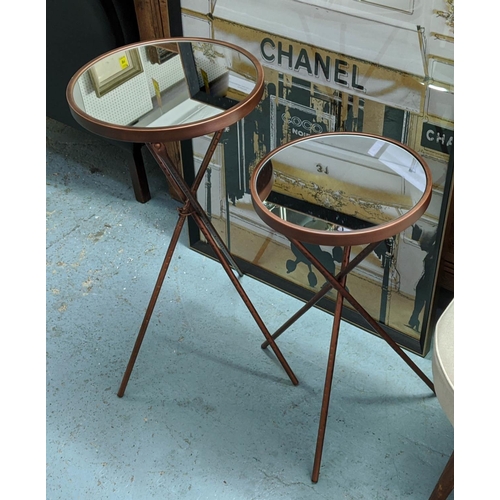 512 - SIDE TABLES, a graduated pair, 35cm diam. x 71cm H at largest, 1950s Italian style, mirror and coppe... 