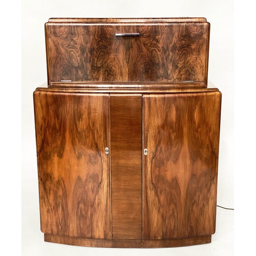 118 - ART DECO COCKTAIL CABINET, figured walnut with rising mirror lined cabinet above two panel doors, 93... 