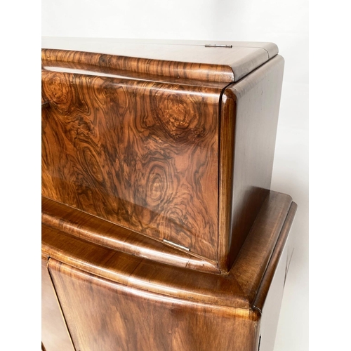 118 - ART DECO COCKTAIL CABINET, figured walnut with rising mirror lined cabinet above two panel doors, 93... 