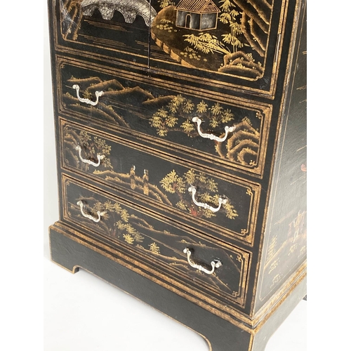 127 - LINEN CHEST, lacquered and gilt Chinoiserie decorated with two doors above three long drawers, 66cm ... 