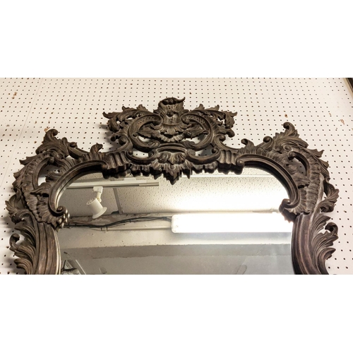 236 - WALL MIRRORS, a pair, Rococo style, ebonised wood finish with scrolled acanthus leaf frames, 117cm H... 