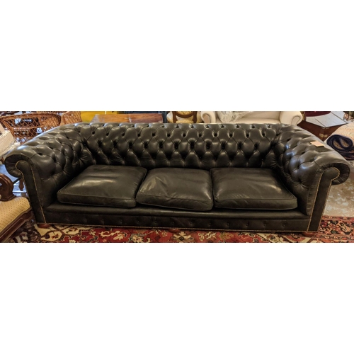 231 - CHESTERFIELD SOFA, 265cm L x 73cm H bought from Harrods, three seater with black leather upholstery.