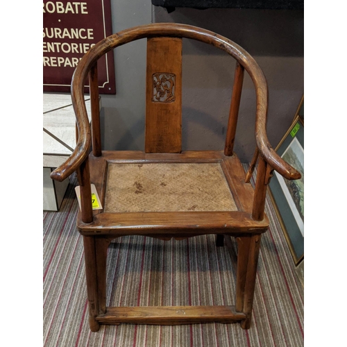 225 - CHINESE ARMCHAIR, elm, continuous back and arm rests, intertwined cane work seat, 94cm H x 66cm x 60... 