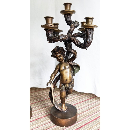 318 - PUTTI CANDELABRA, a pair, spelter, each 5 branch, 68cm H. (2)