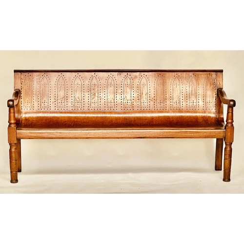 370 - WAITING ROOM BENCH, 19th century mahogany framed with fruitwood and plywood pierced seat, 194cm W.