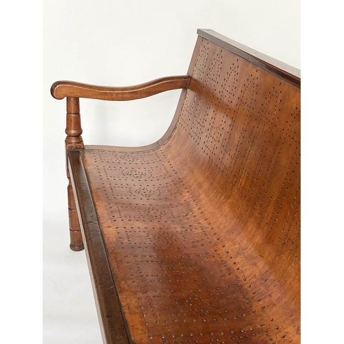 370 - WAITING ROOM BENCH, 19th century mahogany framed with fruitwood and plywood pierced seat, 194cm W.