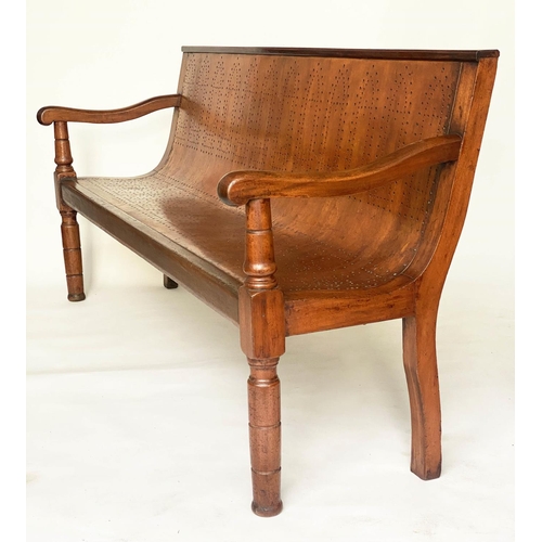 370 - WAITING ROOM BENCH, 19th century mahogany framed with fruitwood and plywood pierced seat, 194cm W.