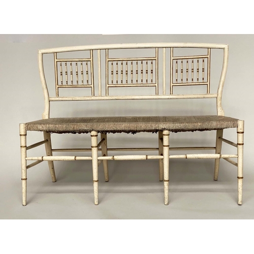 363 - HALL SEAT, 19th century Aesthetic cream and gilt heightened with rail back and rush seat, 117cm W.