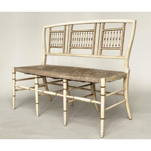 363 - HALL SEAT, 19th century Aesthetic cream and gilt heightened with rail back and rush seat, 117cm W.