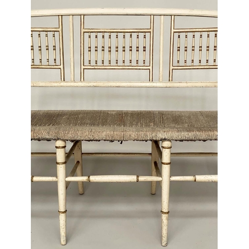 363 - HALL SEAT, 19th century Aesthetic cream and gilt heightened with rail back and rush seat, 117cm W.