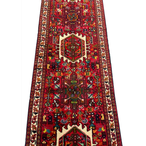 101 - PERSIAN KARAJA RUNNER, 395cm x 75cm.