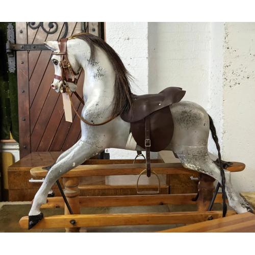 164 - ROCKING HORSE, 96cm H x 98cm H, painted, on pine base.