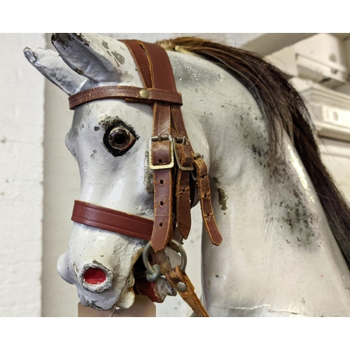 164 - ROCKING HORSE, 96cm H x 98cm H, painted, on pine base.