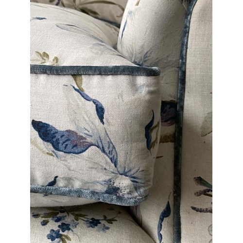 175 - SOFA, Country House style foliate printed upholstery, scroll arms, feather pads and turned front sup... 