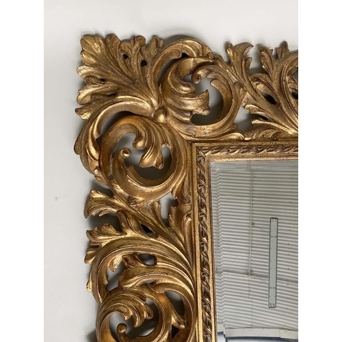 182 - WALL MIRROR, Italian Florentine style giltwood and gesso with broad pierced foliate frame and bevell... 