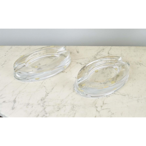 2 - BACCARAT CRYSTAL TRANQUILITY ASHTRAYS, a pair, along with an Orrefors glass vase, vase 21cm H. (3)