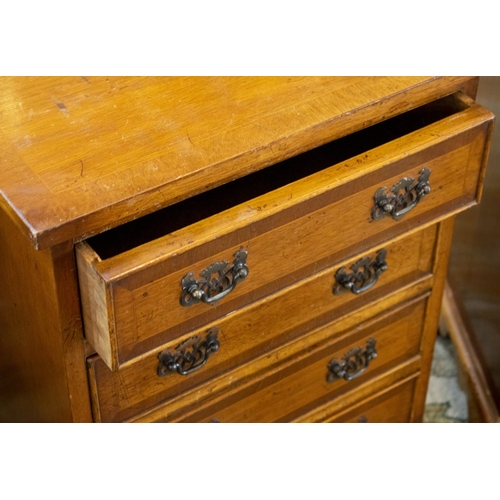 244 - BEDSIDE CHESTS, 62cm H x 45cm W x 33cm D, a pair, Georgian style with four crossbanded drawers. (2)