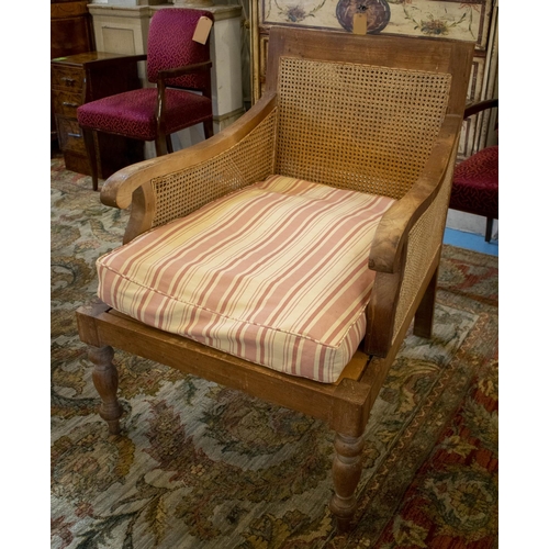 247 - BERGERE, 97cm H x 74cm W x 90cm D, Colonial style teak and caned with striped squab and loose Bennis... 