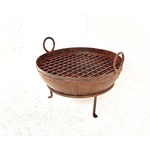 394 - KADAI FIRE BOWL ON STAND, 47cm high, 64cm wide, 60cm diam.