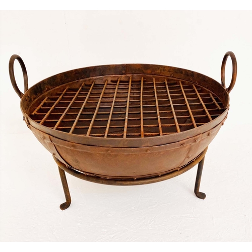 394 - KADAI FIRE BOWL ON STAND, 47cm high, 64cm wide, 60cm diam.