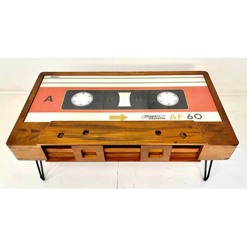 399 - CASSETTE COCKTAIL TABLE, 1970s style design, polychrome panel detail, storage to front, 40cm x 60cm ... 