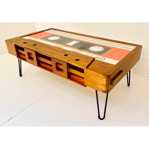 399 - CASSETTE COCKTAIL TABLE, 1970s style design, polychrome panel detail, storage to front, 40cm x 60cm ... 