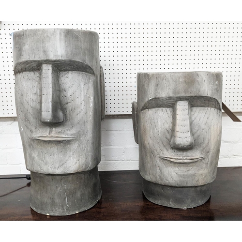 344 - RAPA NUI STYLE PLANTERS, a graduated pair, resin in painted finish, 62cm H at largest. (2)