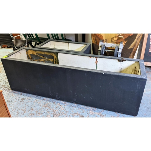 418 - TROUGH PLANTERS, a set of two, 200cm x 50cm x 61cm at largest, black fibre  glass. (2)