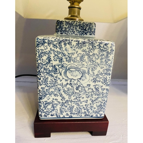 268 - TABLE LAMPS, a pair, Chinese export style blue and white ceramic, with shades, 42cm x 28cm x 28cm.