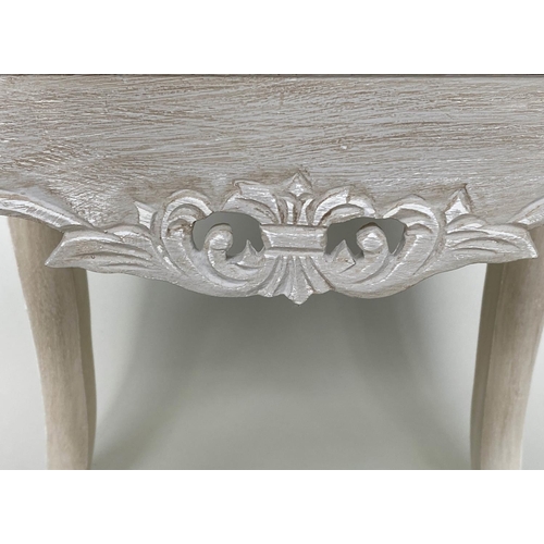 193 - BEDSIDE TABLES, a pair, French style grey painted each with two drawers and carved, pierced apron, 4... 